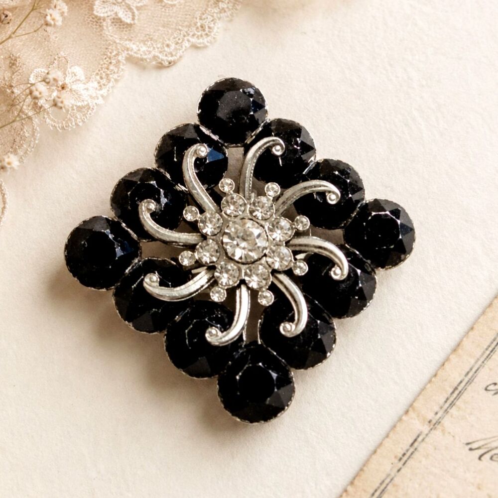 Vintage Black Plastic and Rhinestone Brooch